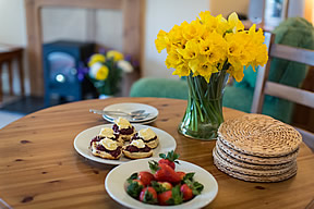 A delicious cream tea greets guests on arrival.